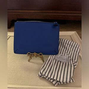 Anya Hindmarch leather royal blue clutch pouch with tassel zip close